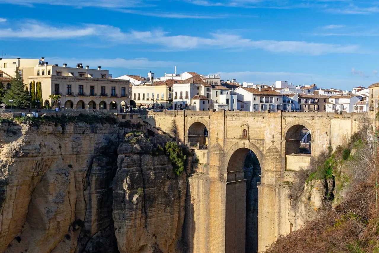 The Puente Nuevo bridge spanning the gorge at Ronda, a popular day trip from Seville, Spain
